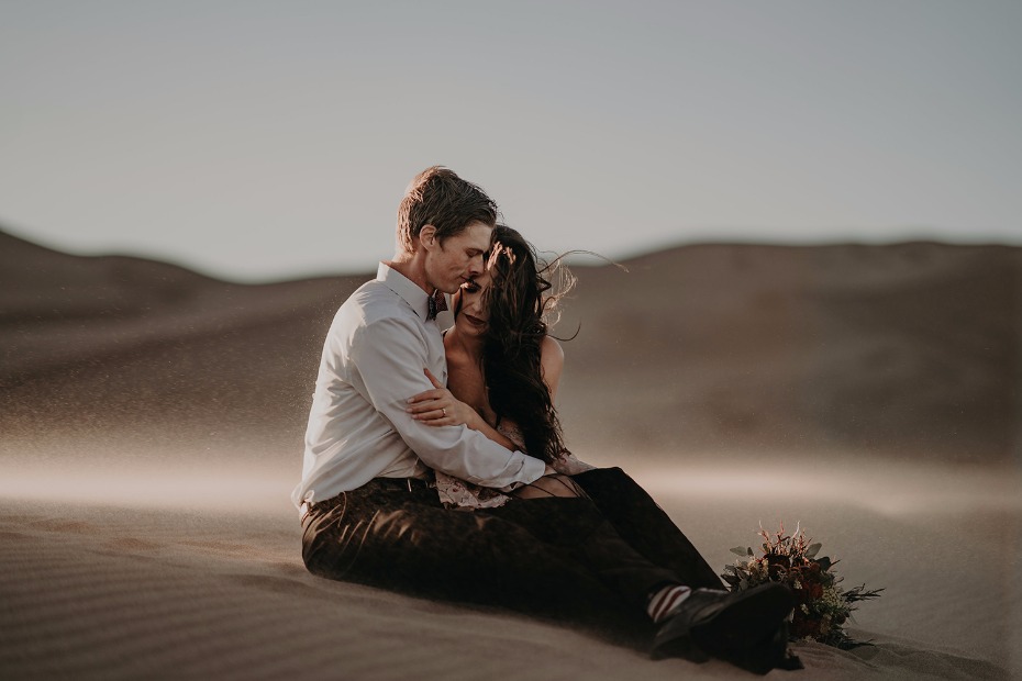 engagement couple amongst some Autumn sand dunes