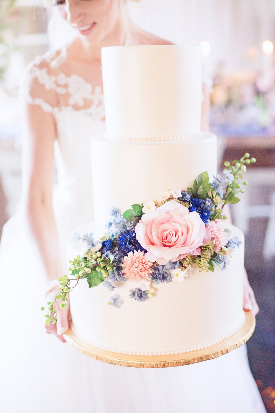 simple and elegant flower accented wedding cake