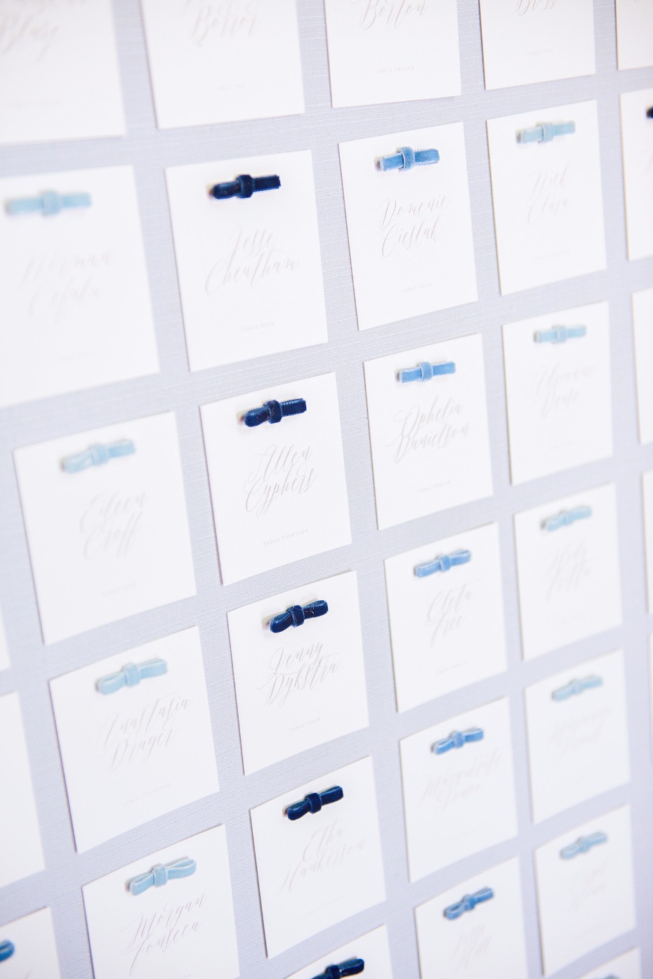 velvet bow accented wedding escort cards
