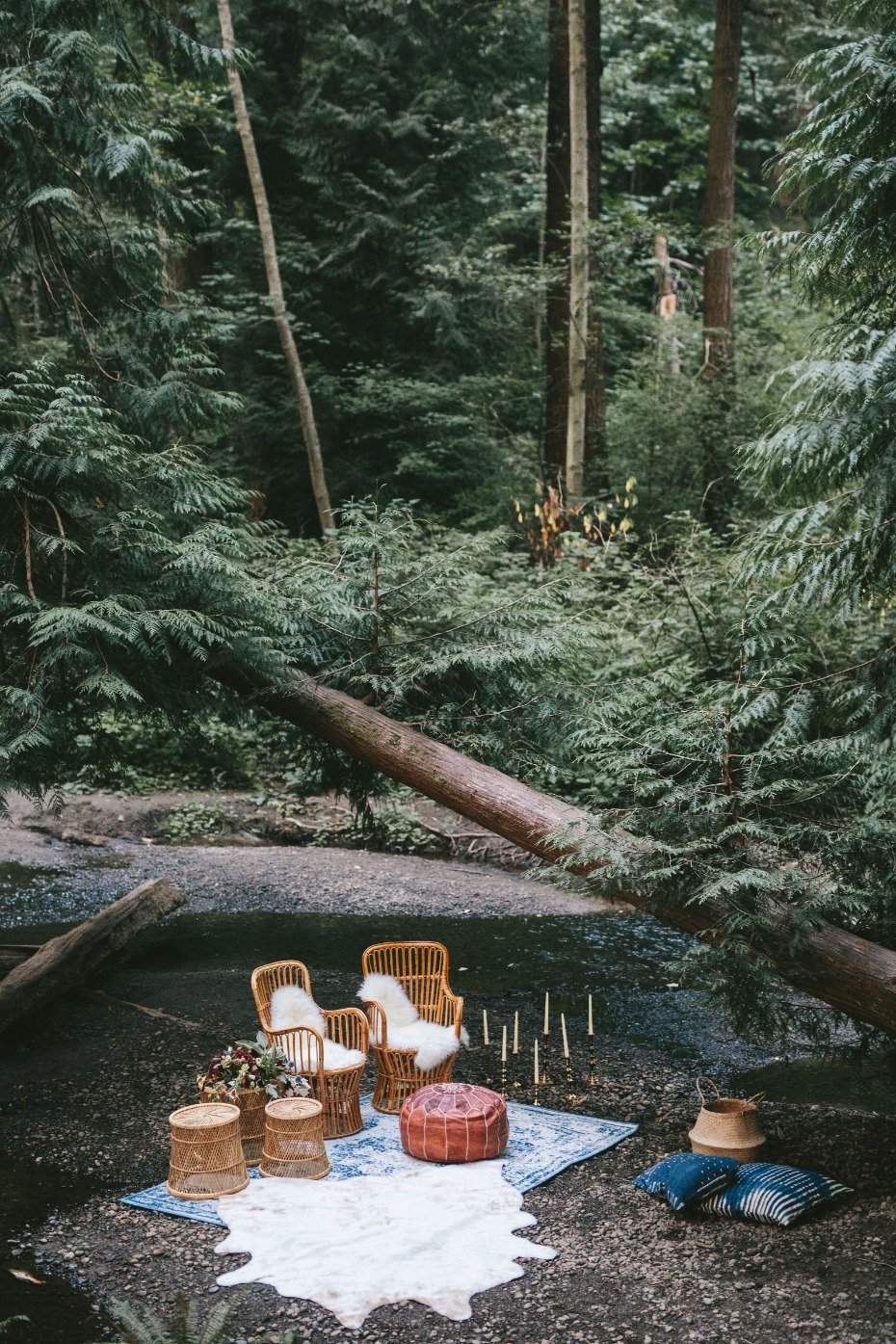 whimsical wedding lounge by a wooded stream