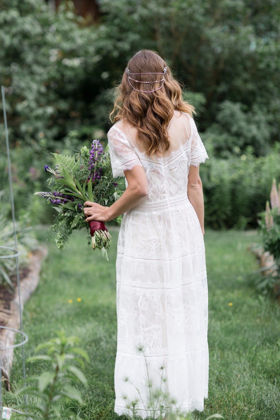 boho chic bridal style with hair chains and foraged wedding flowers