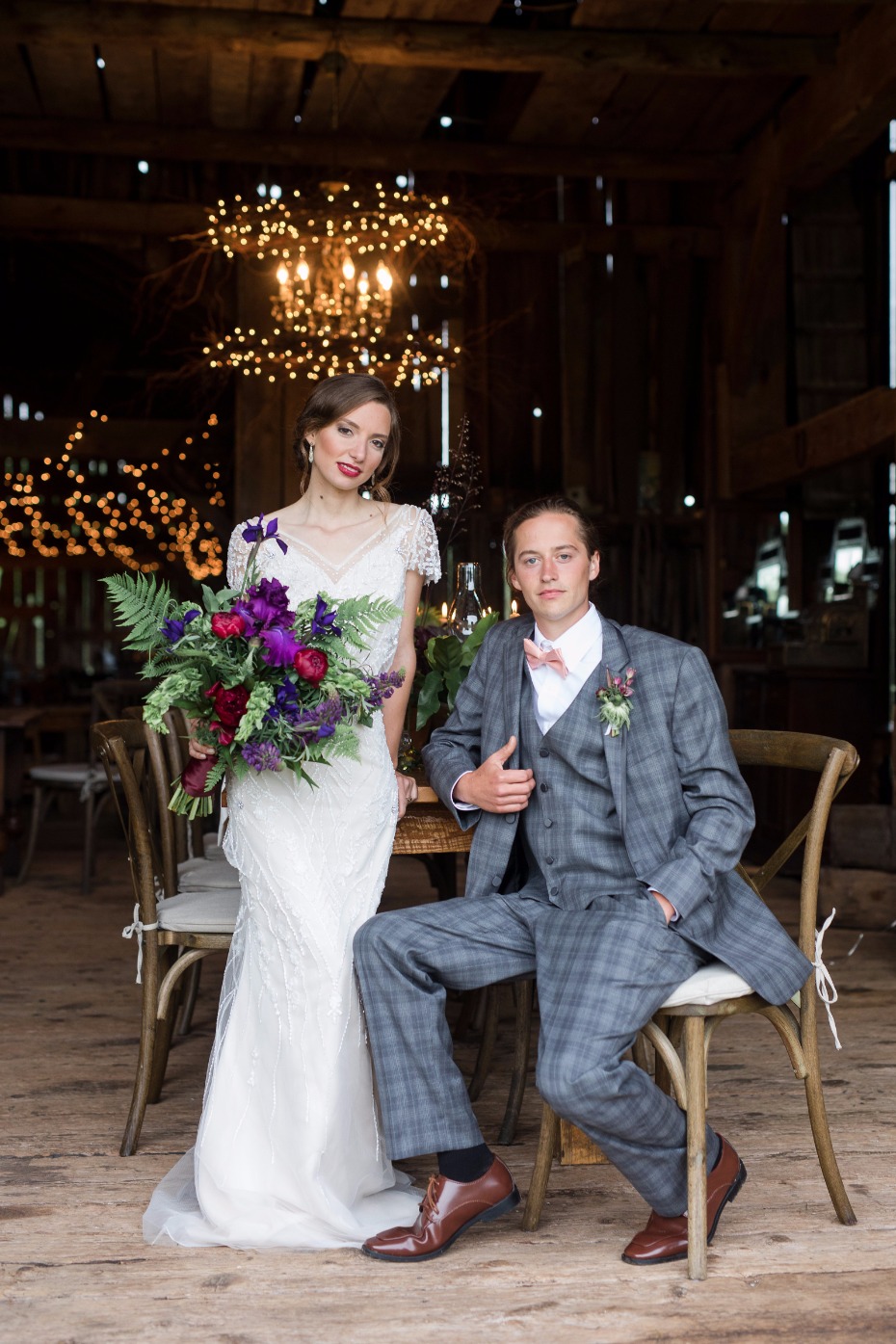 groom in unique plaid suit and bride in a slinky vintage inspired gown