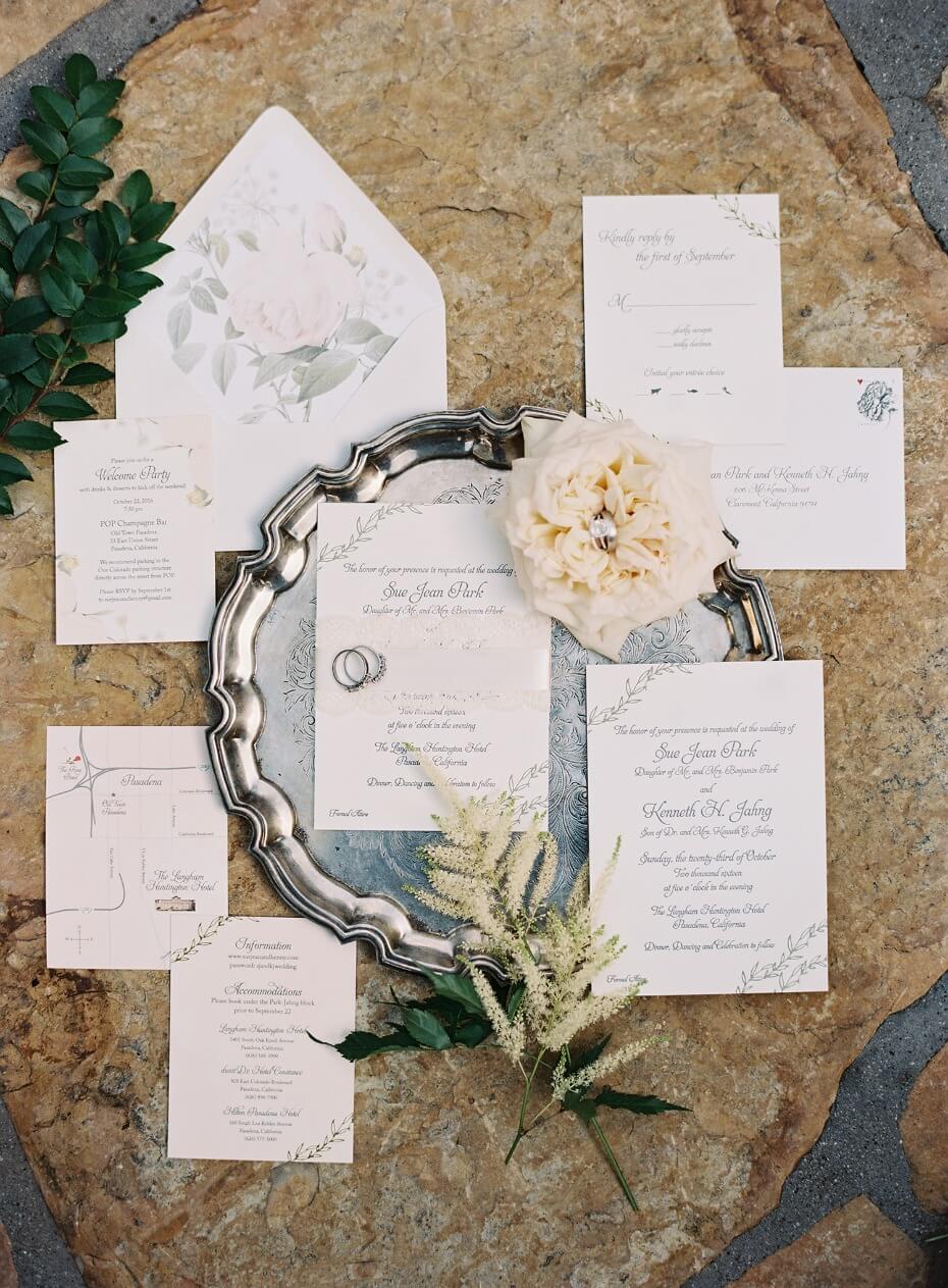 elegant white floral wedding stationery