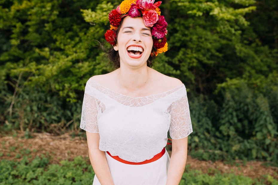 laughing happy bride with floral halo