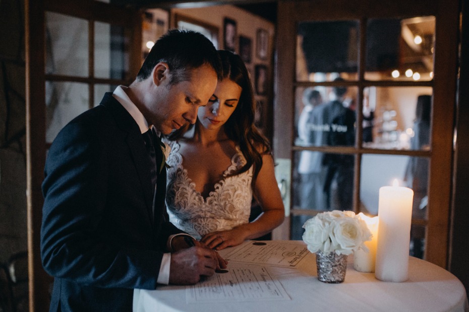 signing the wedding papers