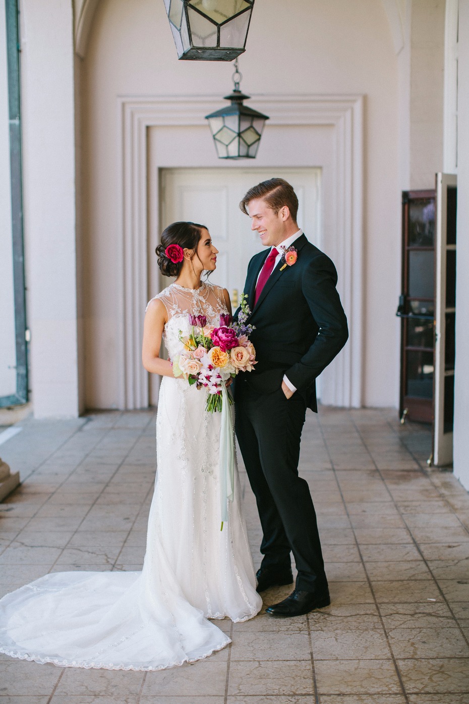 Bride and groom sharing a loving glance on wedding day