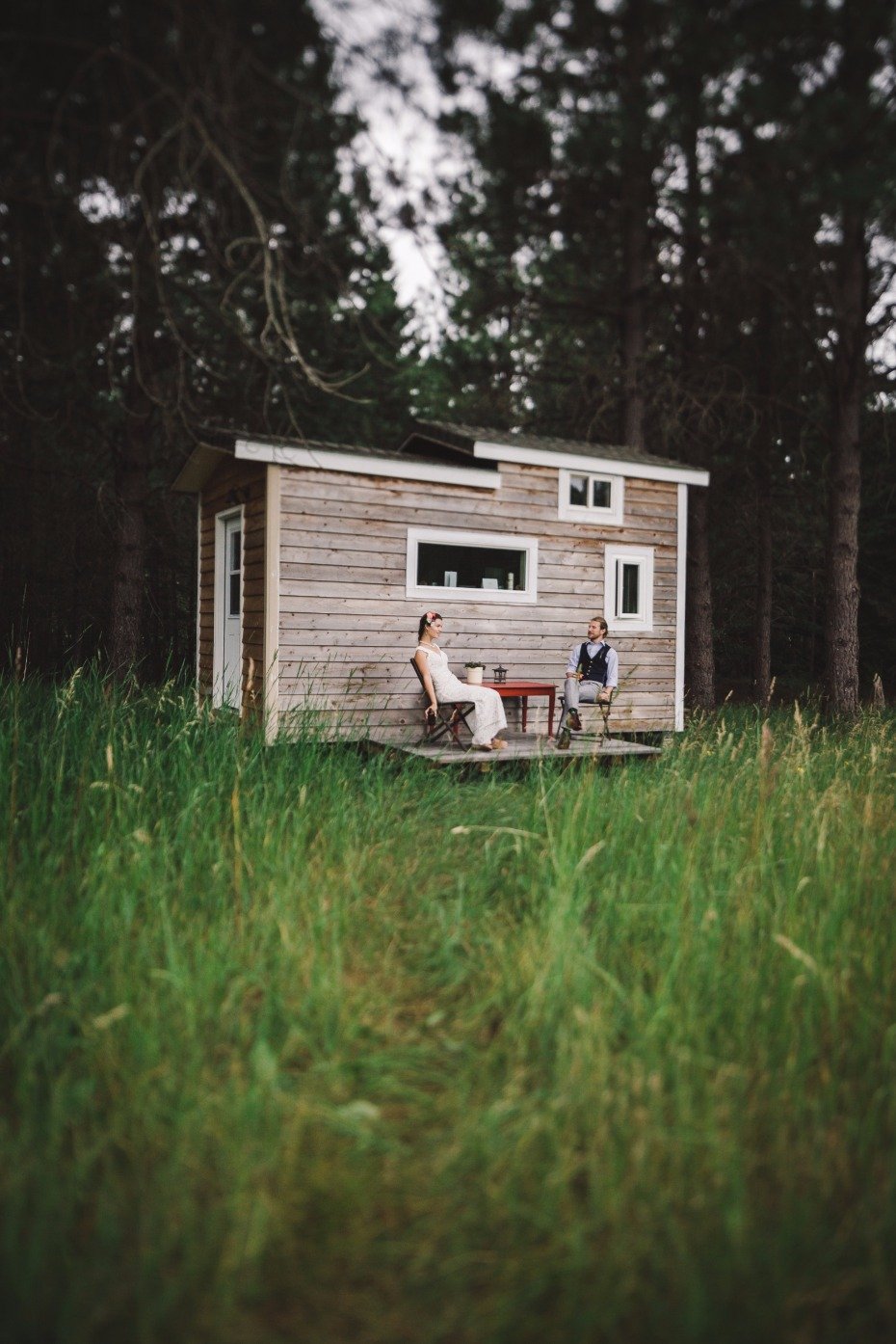 Bride and groom at their tiny house