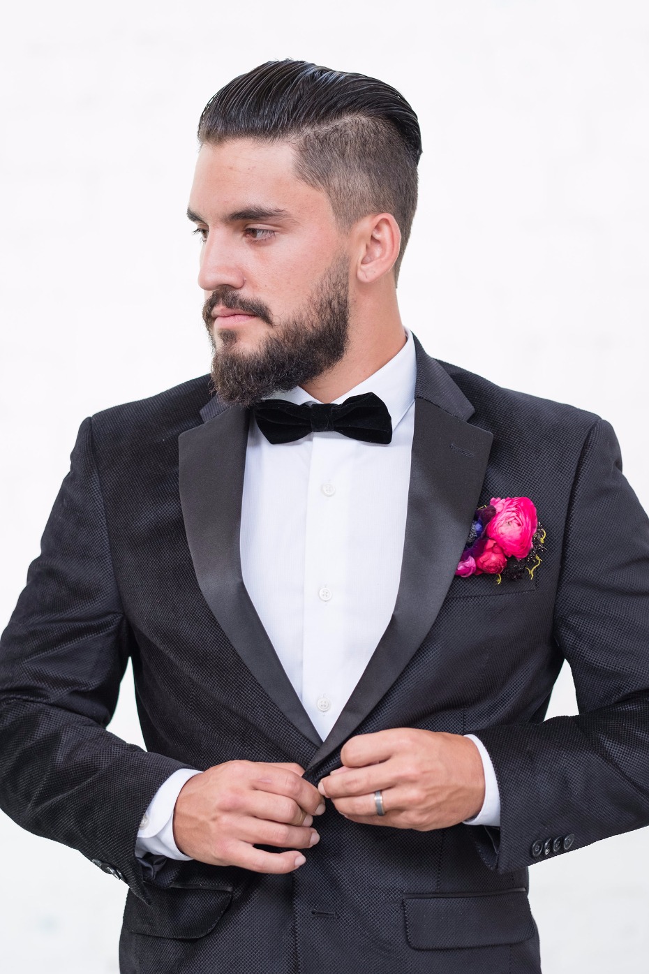 black tie groom style with hot pink boutonniere