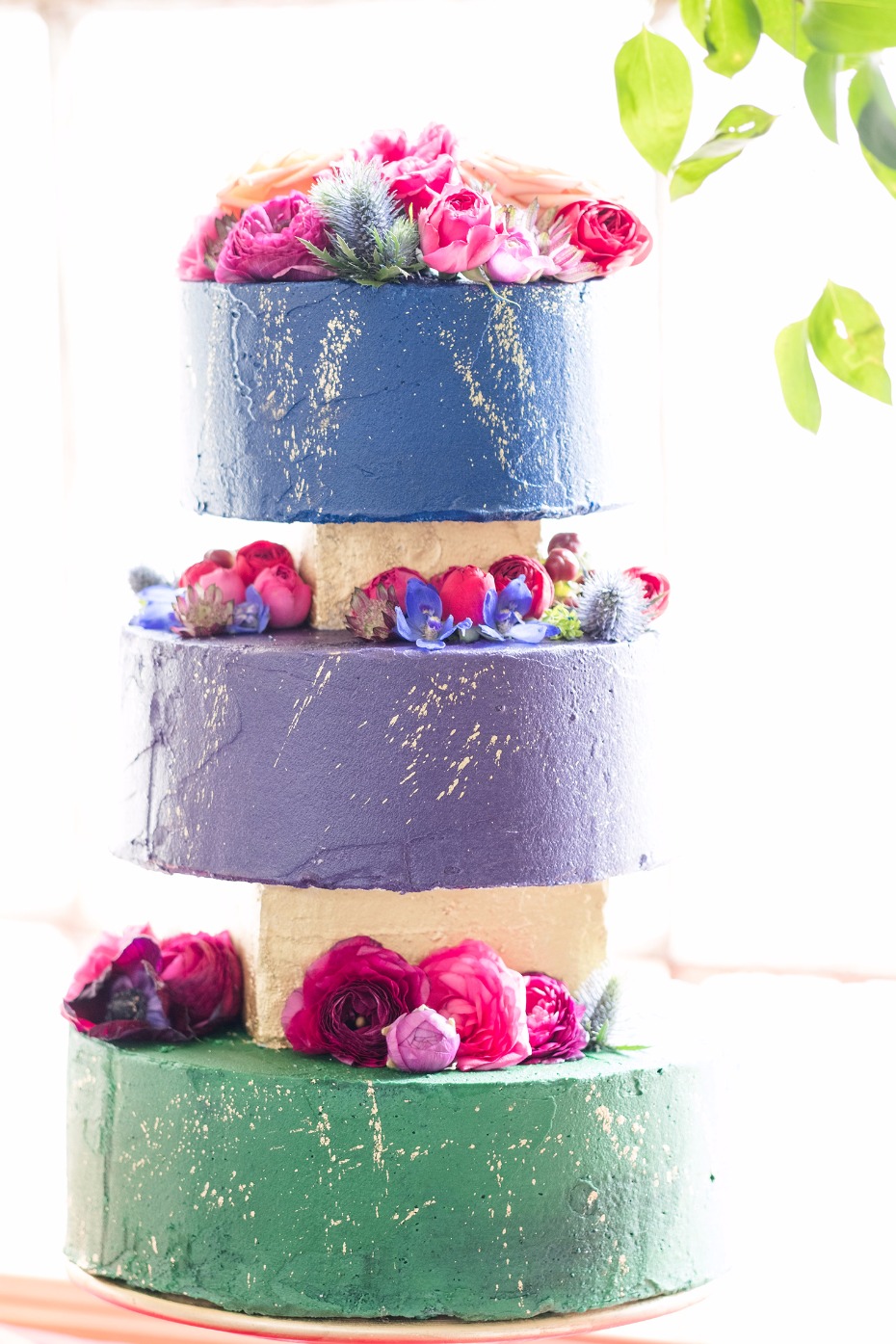 gold flecked jewel tone wedding cake with a modern flair