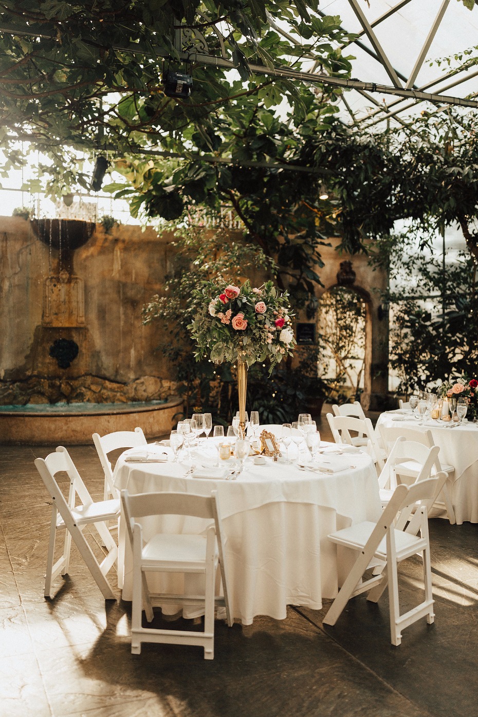 glammed up summer boho wedding reception in the garden room at La Caille