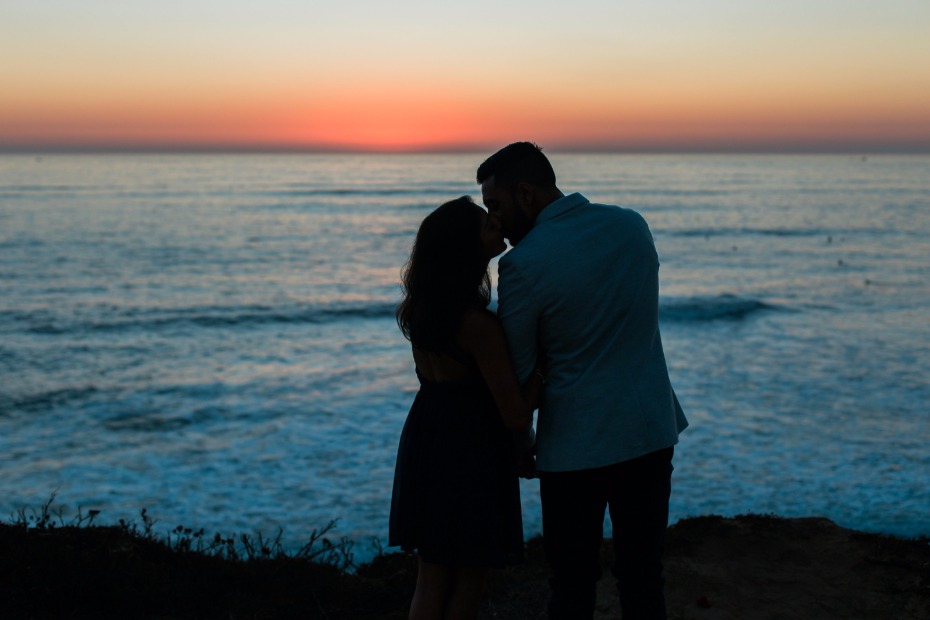 newly engaged taking in the California sunset