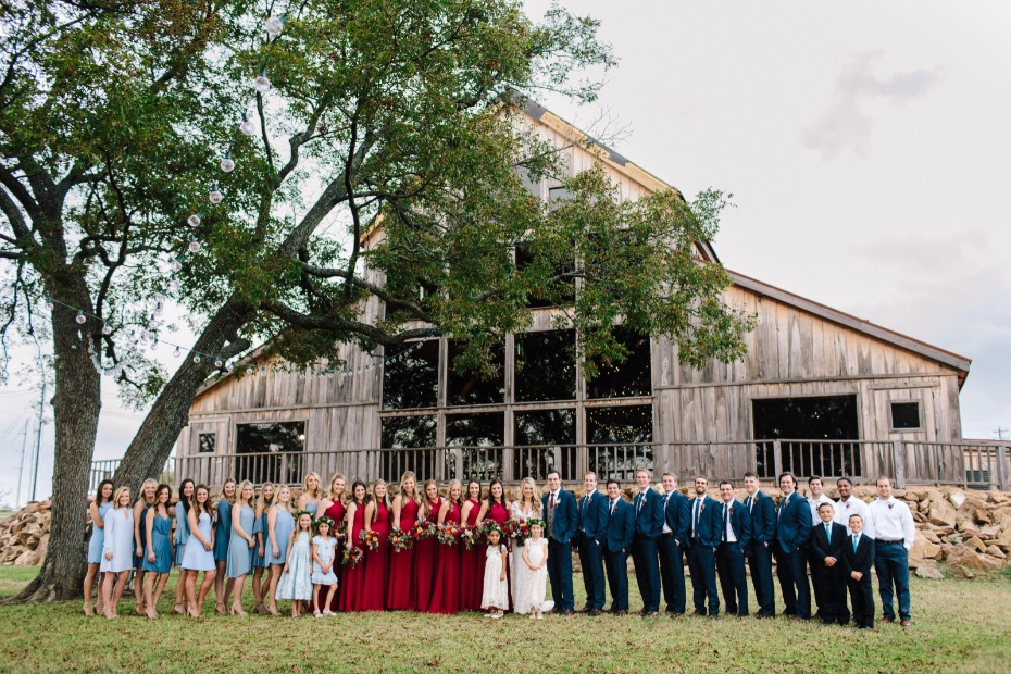 an impressive wedding party for this rustic texas wedding