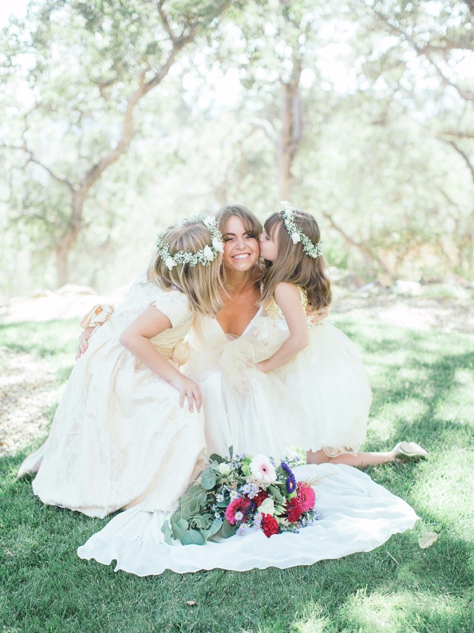 cute flower girl and bride wedding photo pose