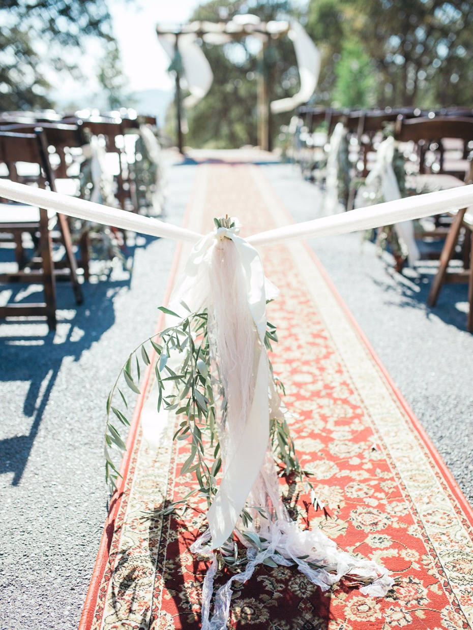 wedding aisle boho style oriental rug aisle decor