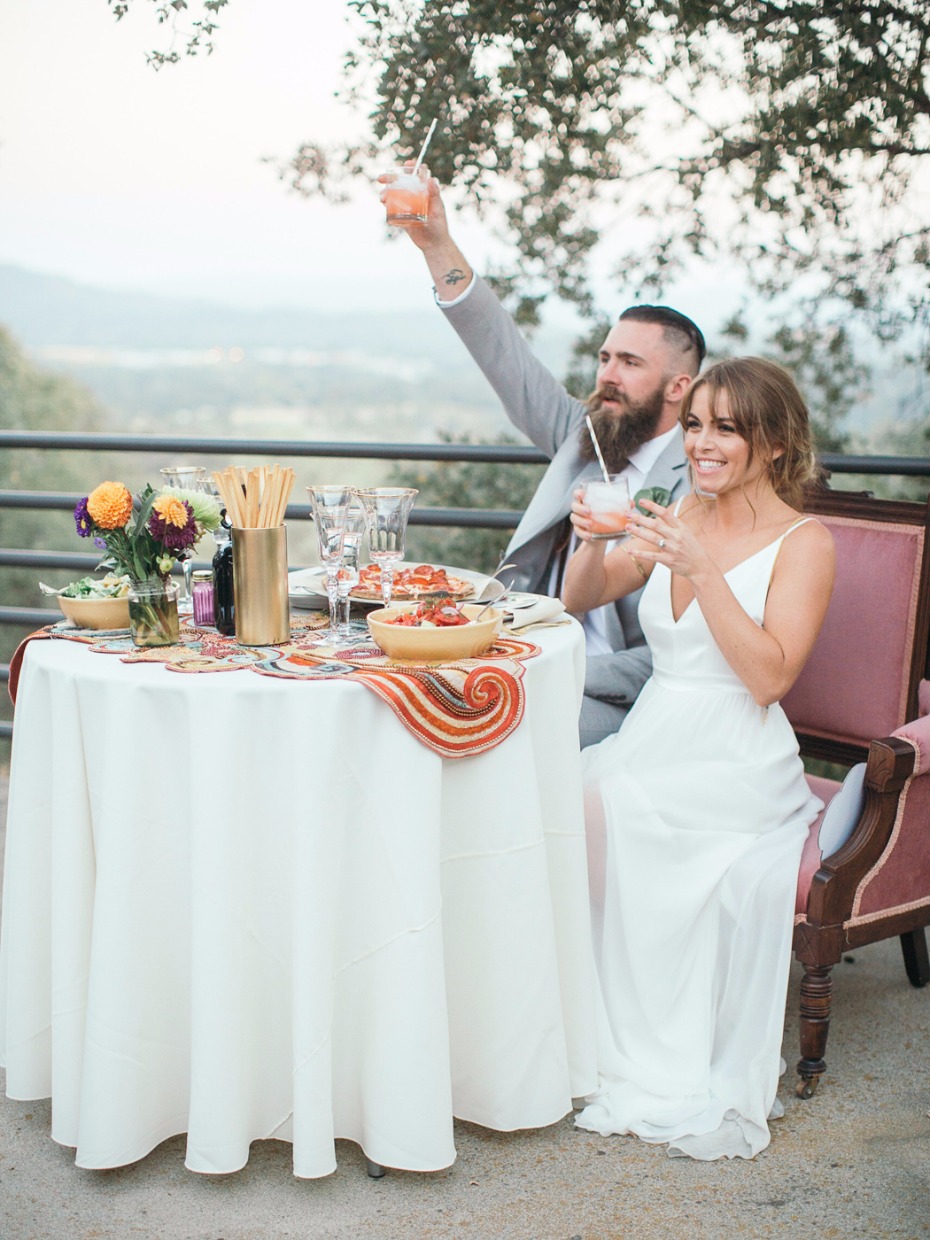 boho sweetheart table with mismatched details
