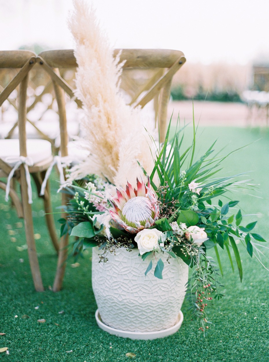 tropical meets desert wedding floral arrangement