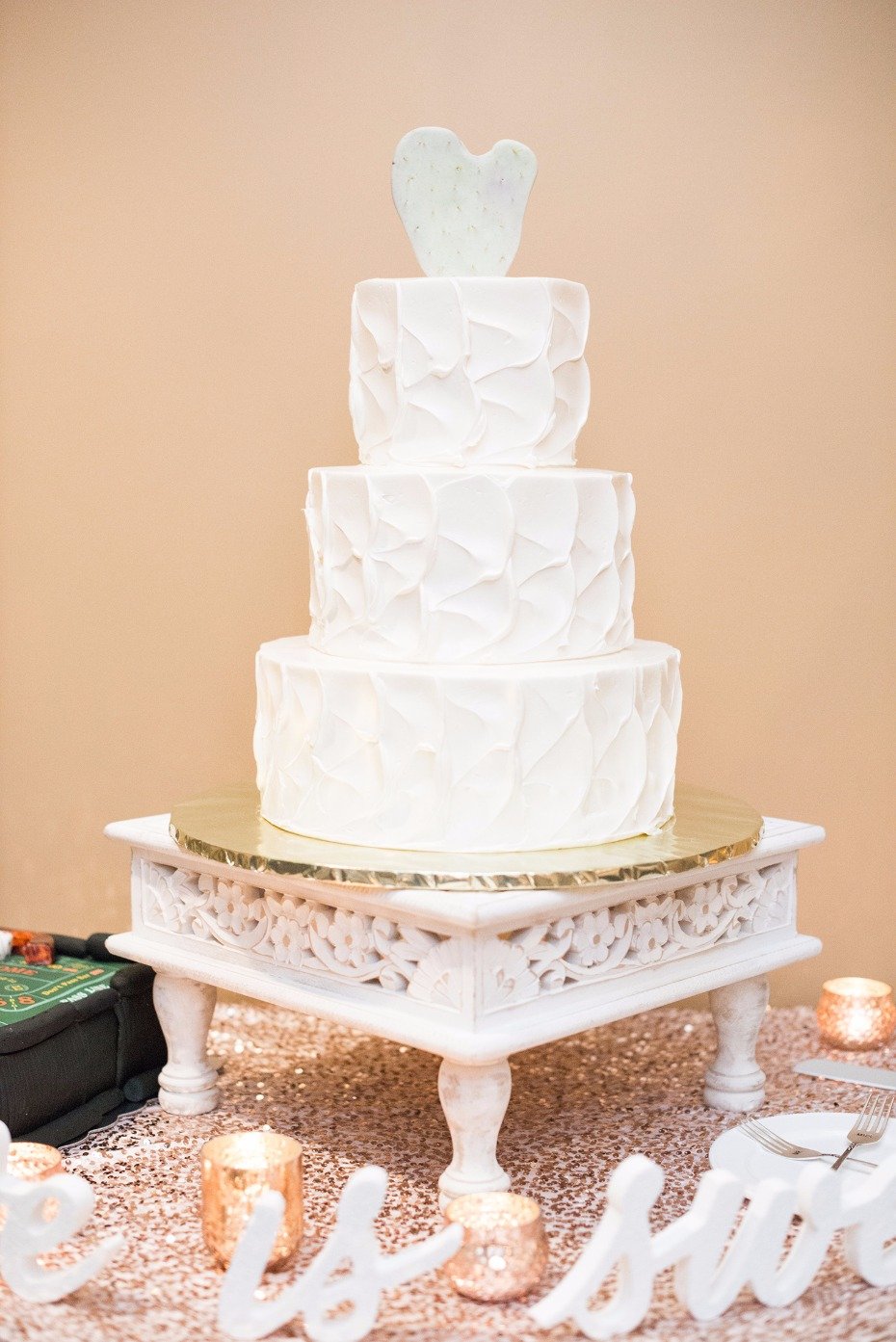 cactus topped wedding cake