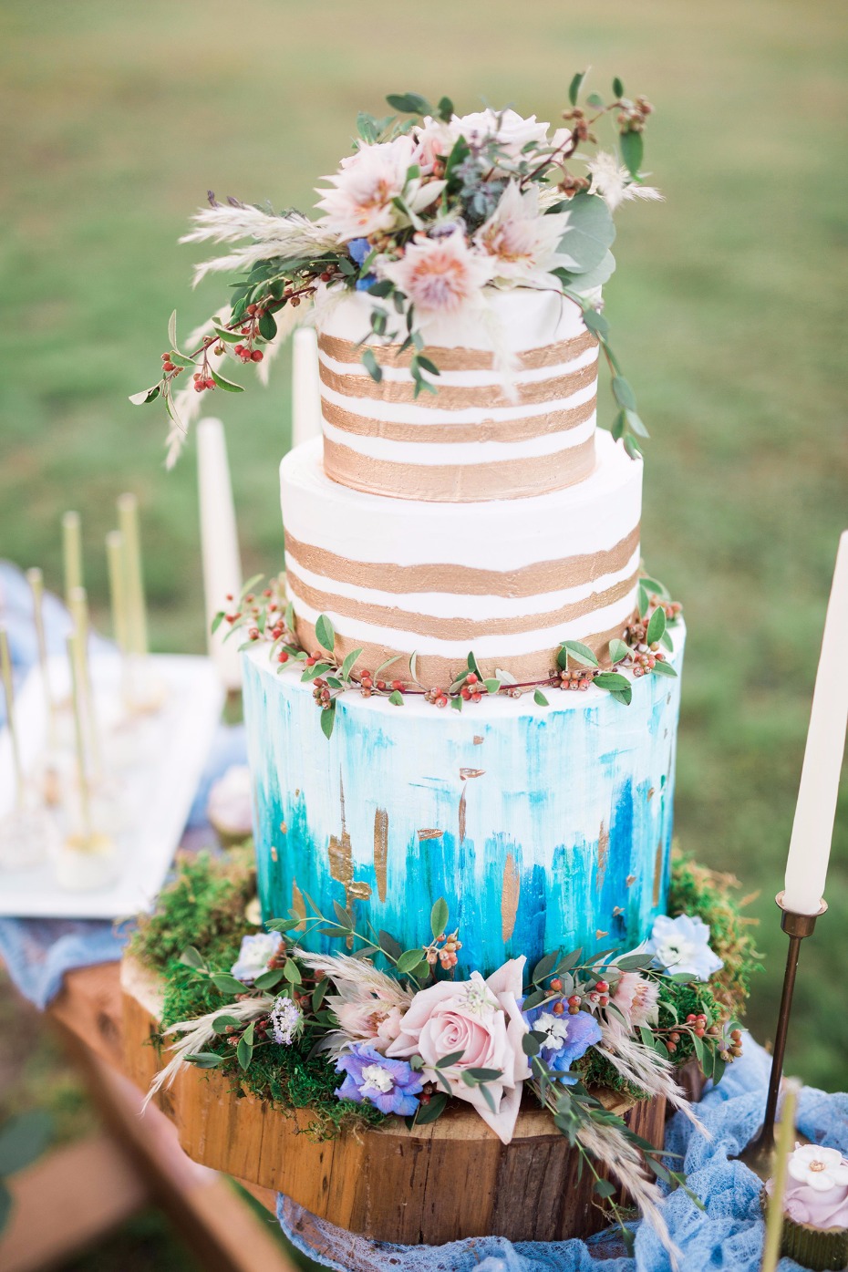 Gold and blue painted wedding cake