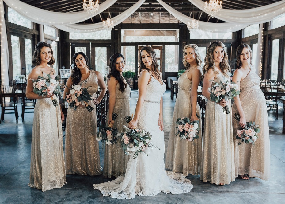 bridesmaids in sparkling champagne dresses