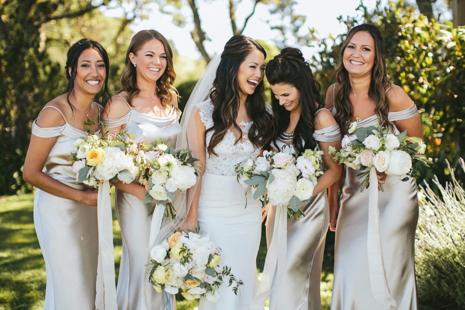 bride and her bridesmaids in silver dresses