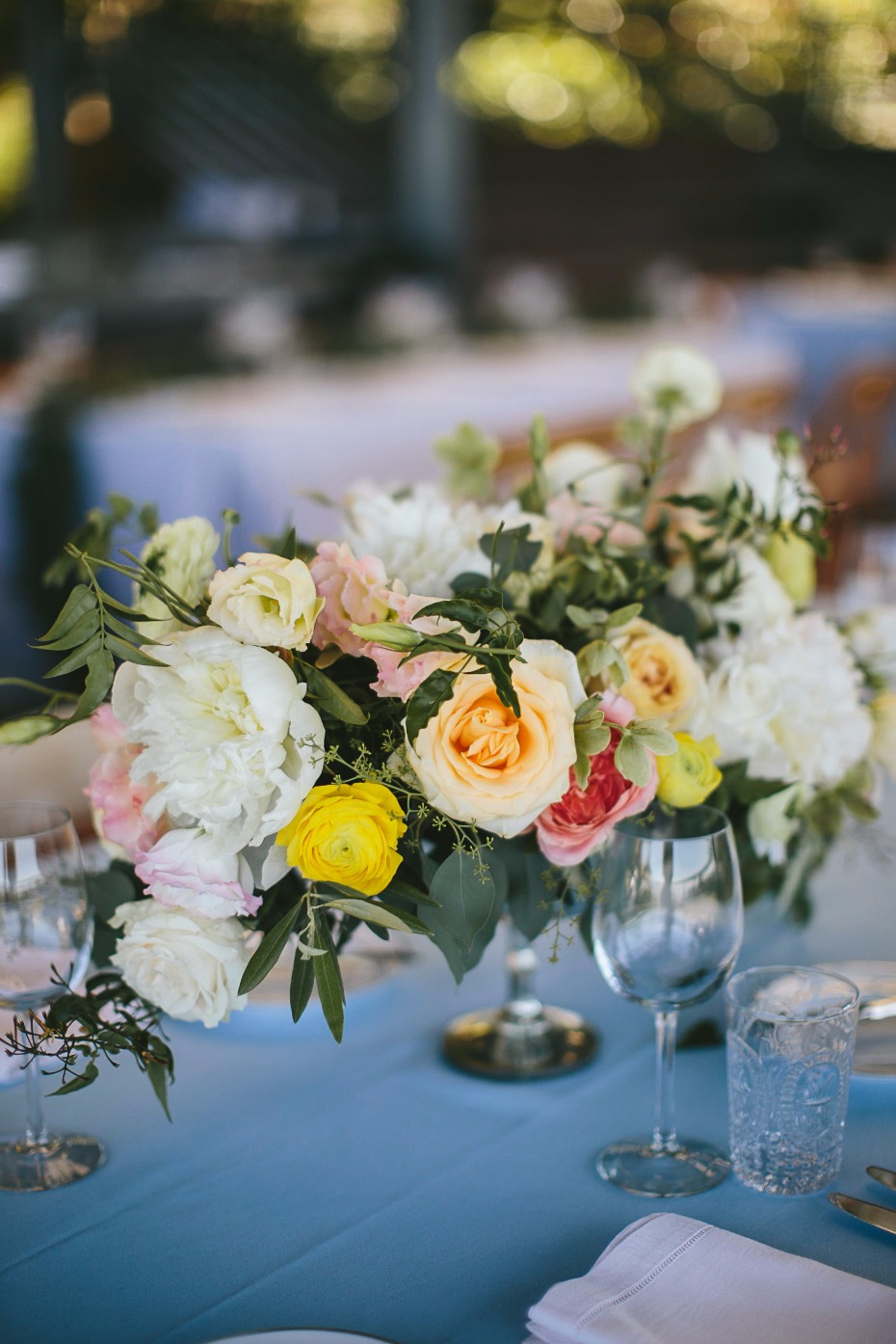 peach pink and yellow wedding centerpiece
