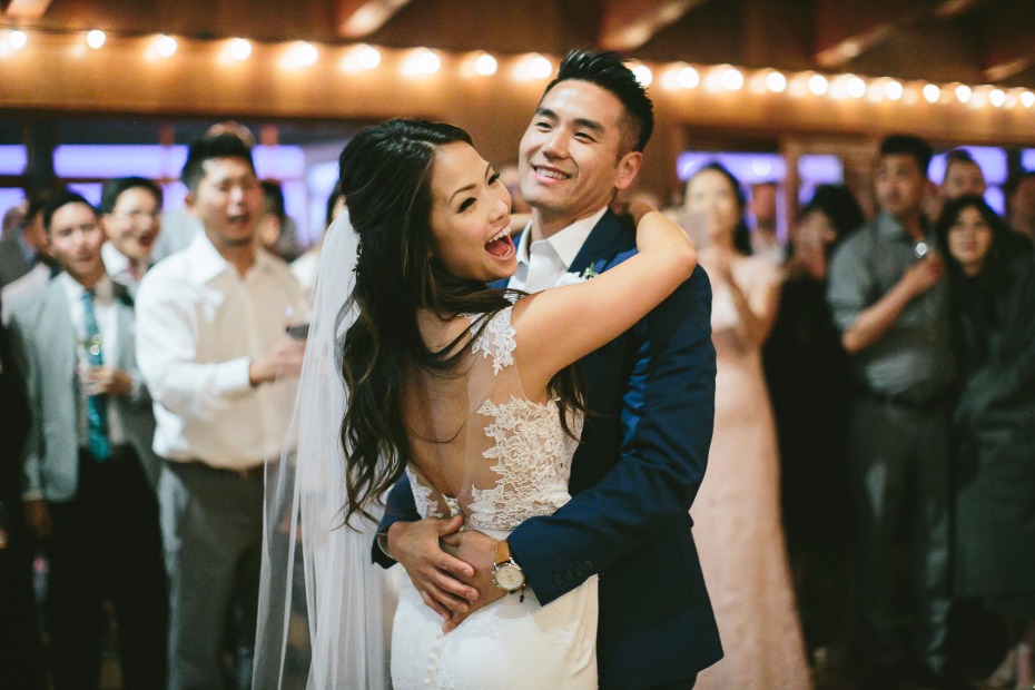 candid photo of bride and grooms first dance