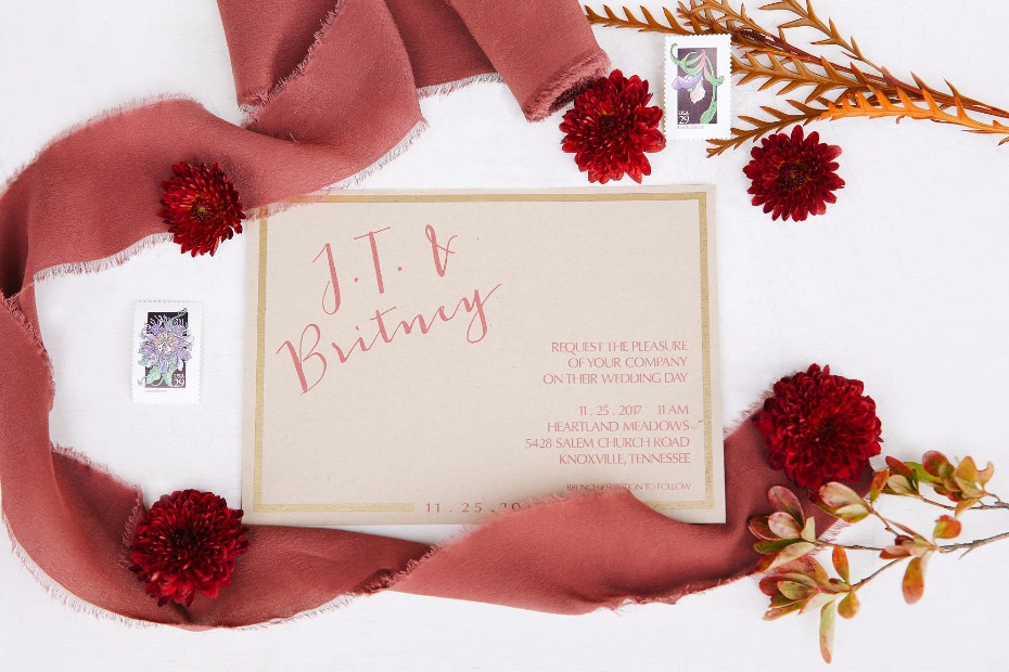 wedding invitation in blushing calligraphy