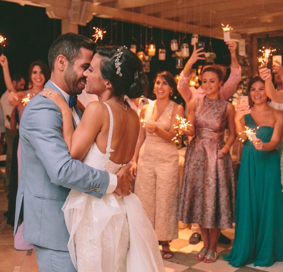 first dance surrounded by loved ones and sparklers