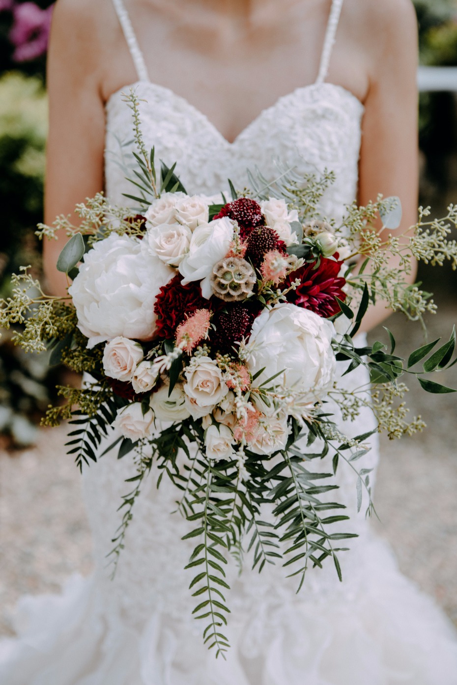 white and blush and burgundy wedding bouquet