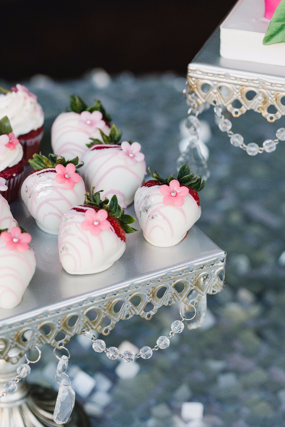 hand dipped strawberries on a vintage esque cake stand from Opulent Treasures