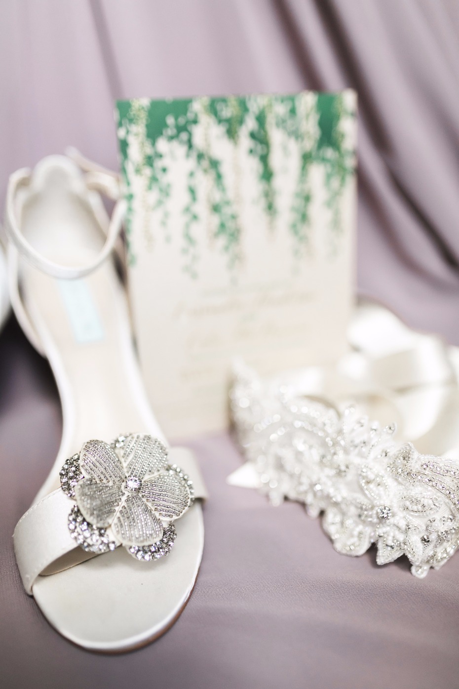 flower accented white wedding shoes