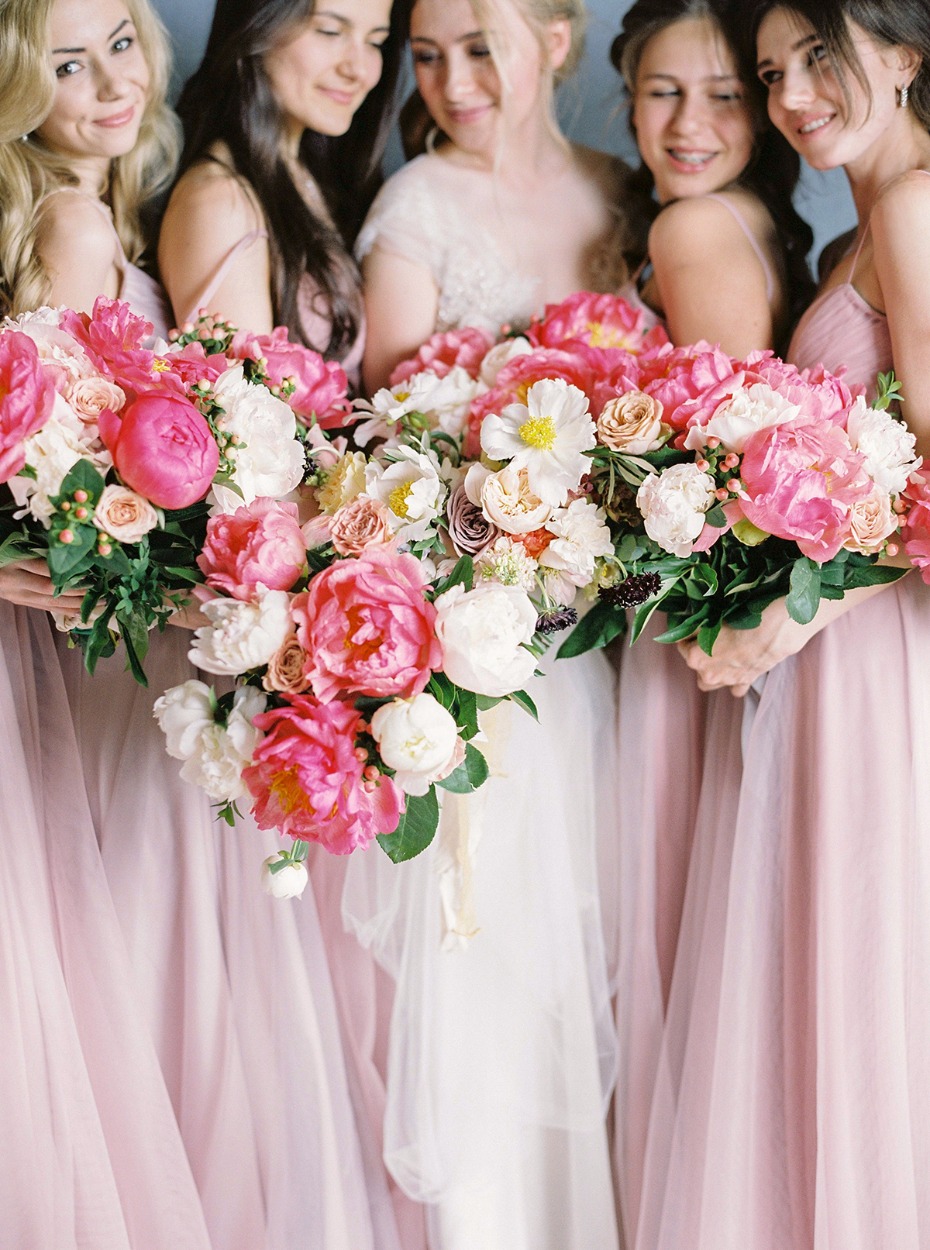 bridesmaids in soft pink dresses