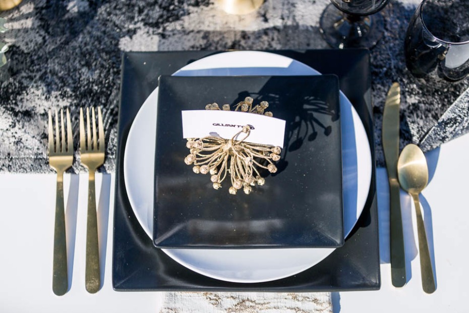black and gold futuristic wedding table setting