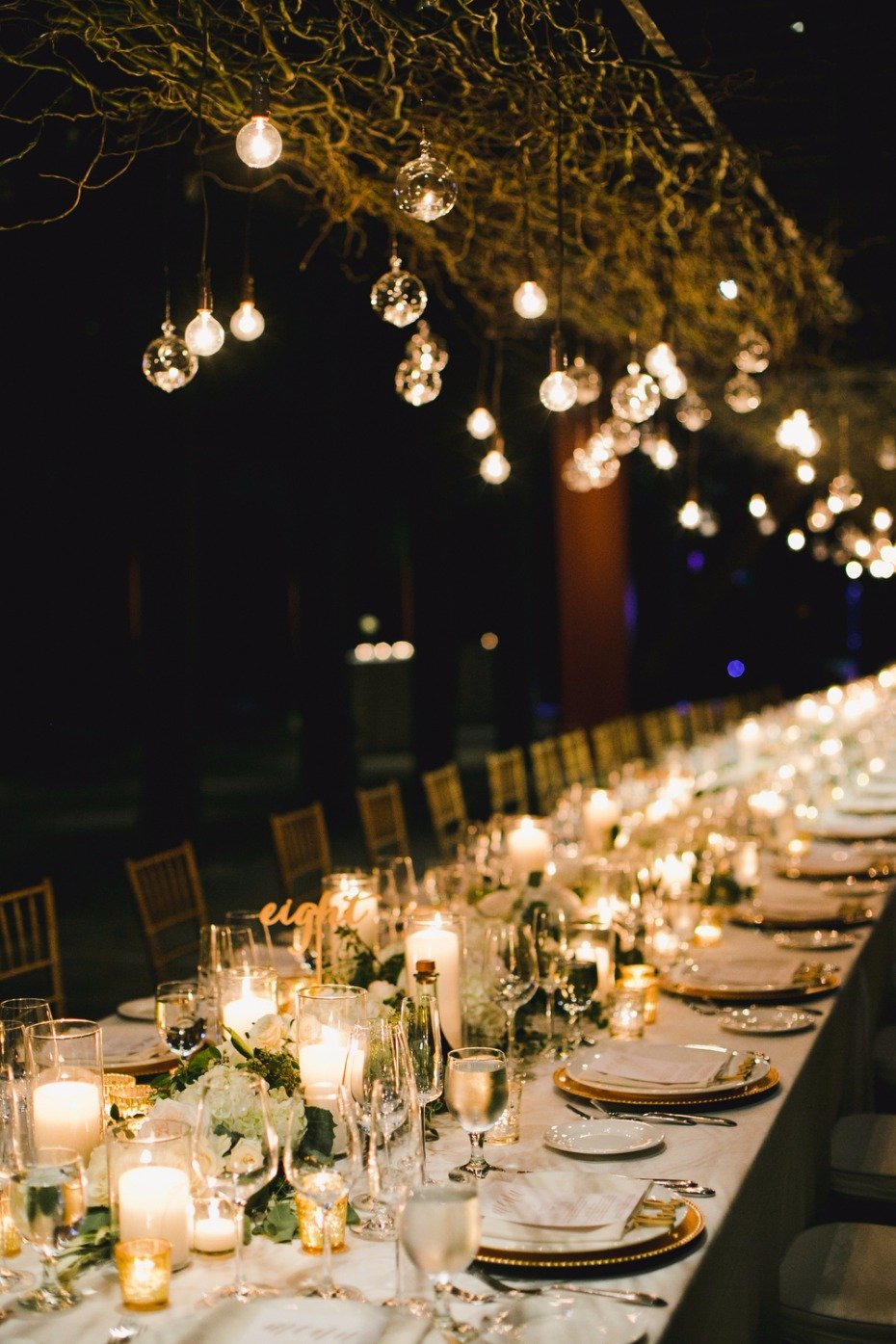 elegant candle lit family style wedding table
