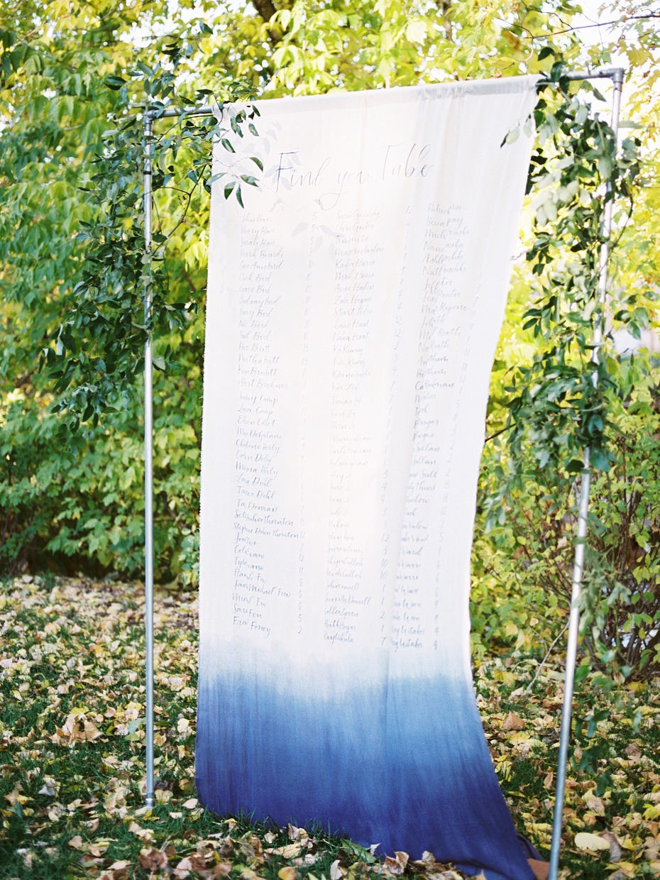 dip dyed wedding seating assignment display