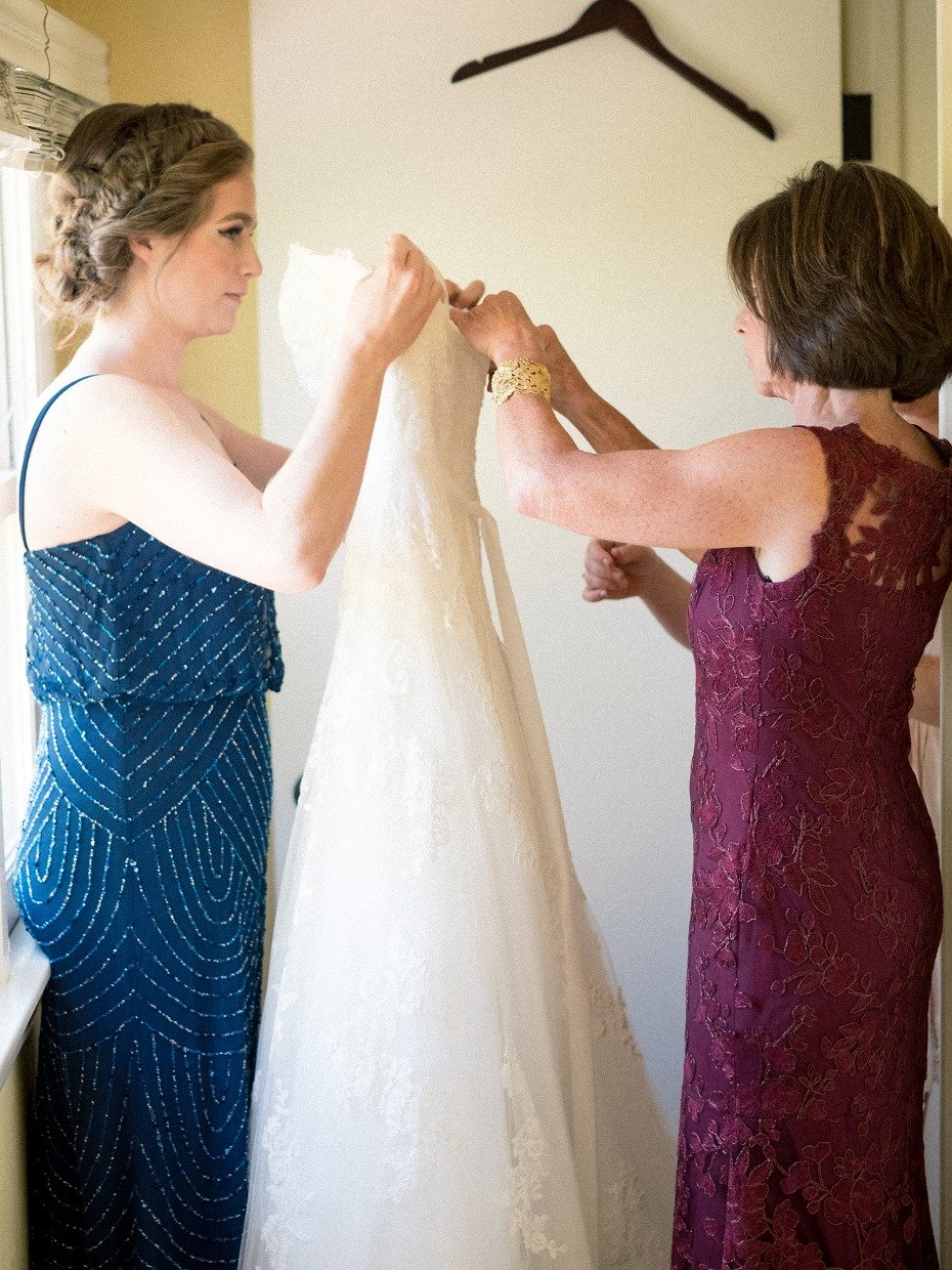 getting the dress ready for the bride