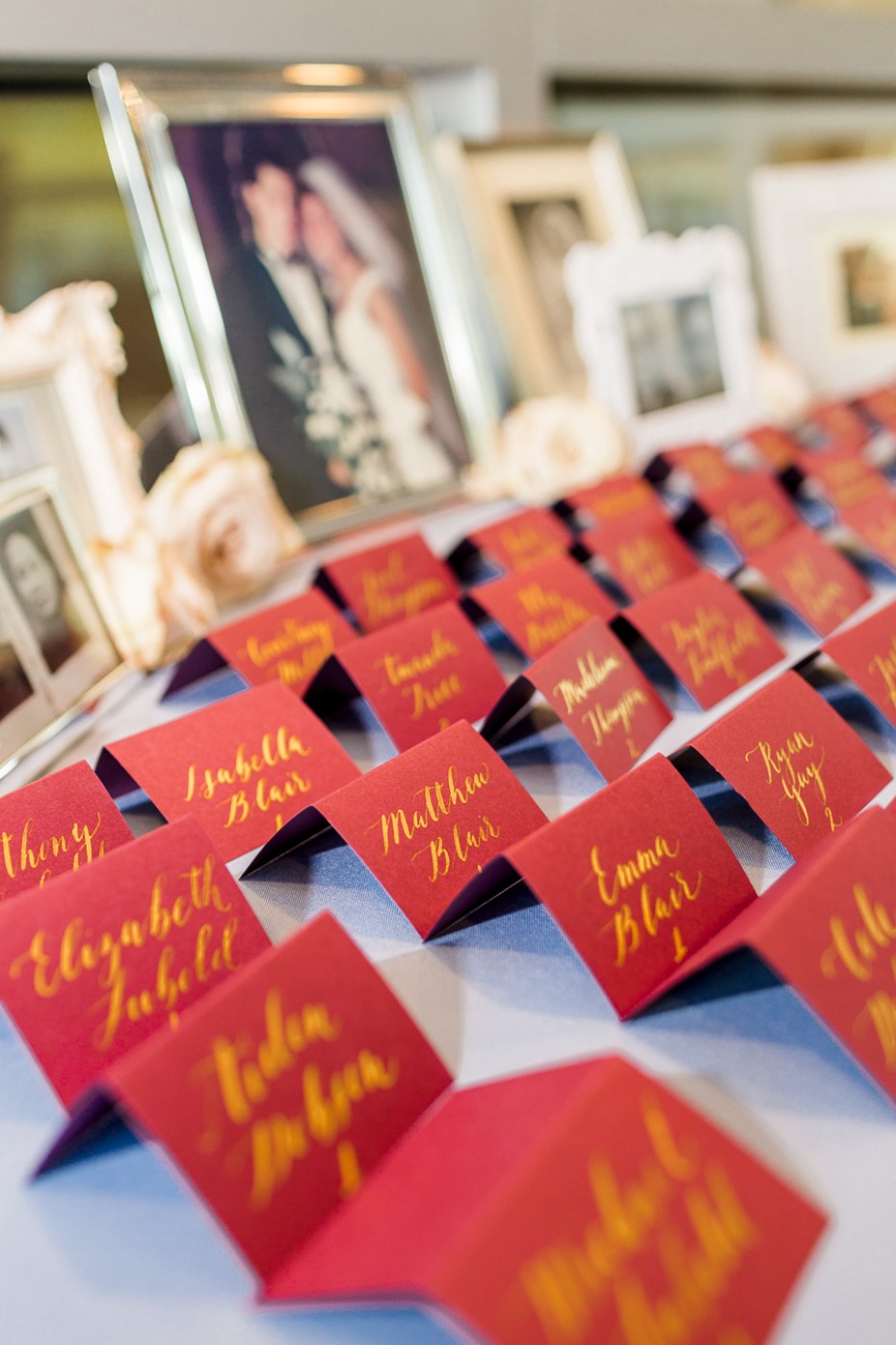 red and gold wedding escort cards