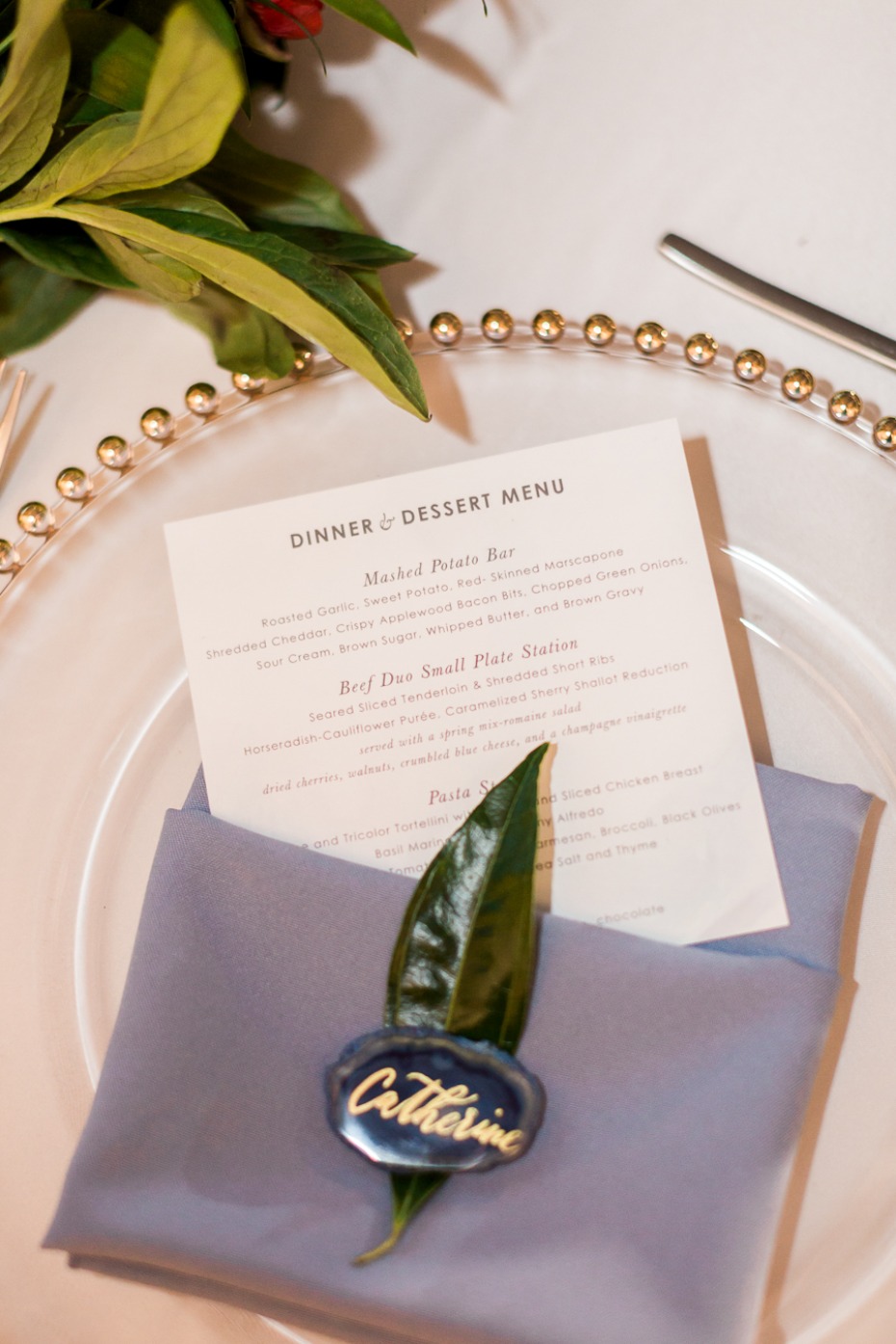 blue and gold wedding table setting with square menu