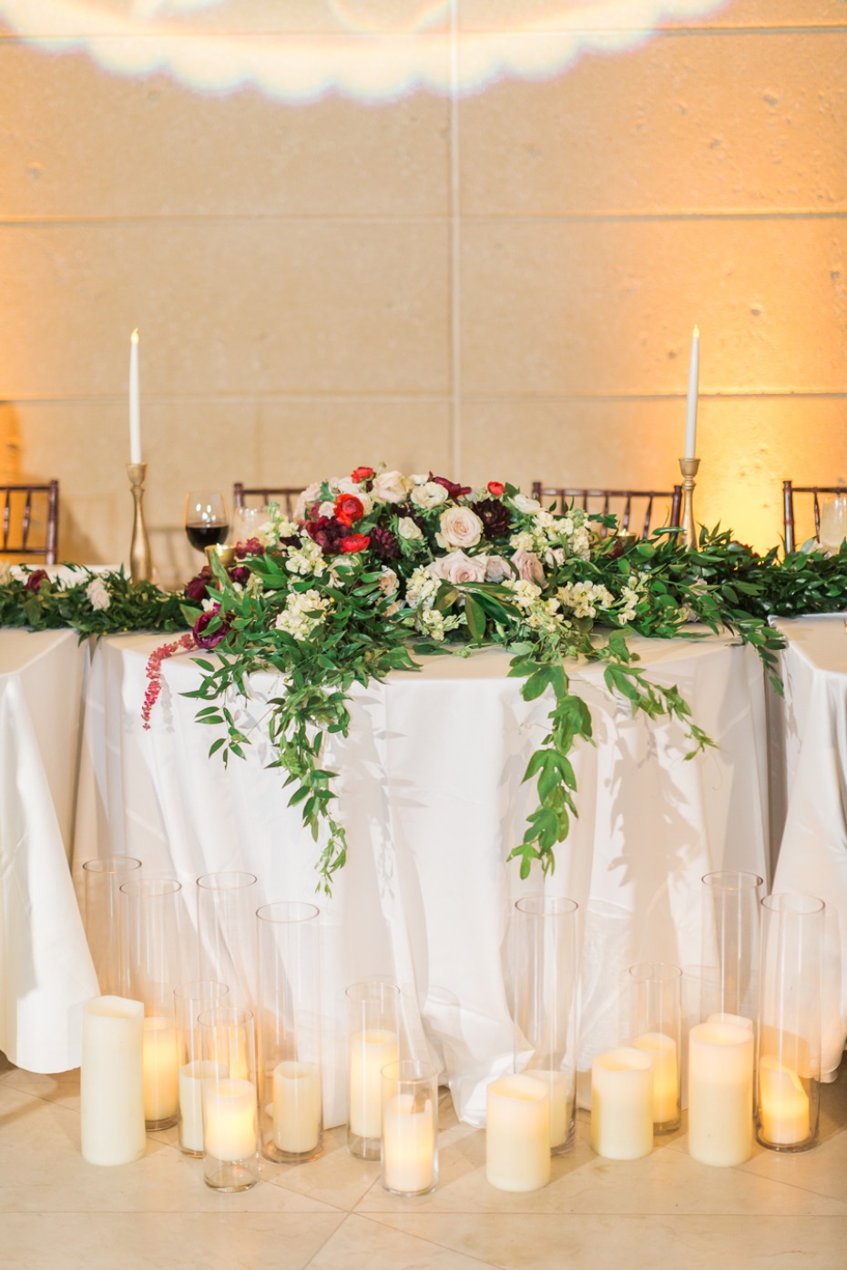 sweetheart table lit by candles