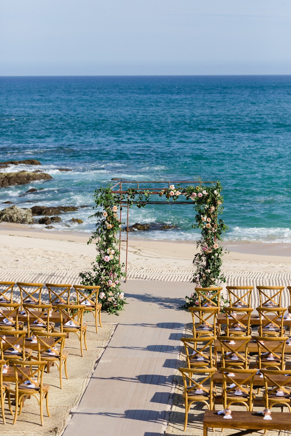 Flower arch ocean front wedding in Mexico