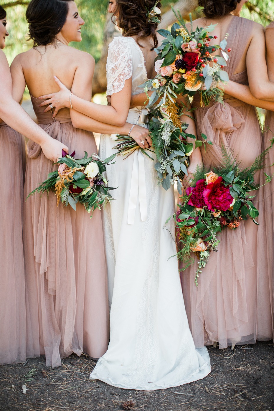 Bridal party in matching brown sugar bridesmaid dresses