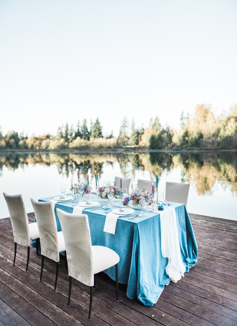 Lakefront reception table with blue linens