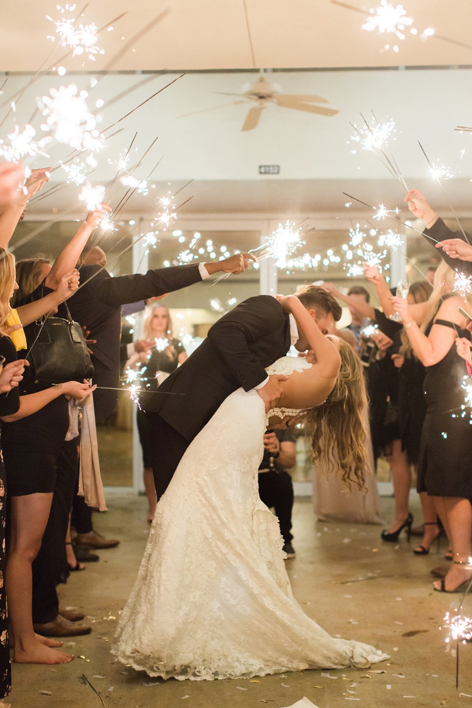 wedding kiss and sparkler exit
