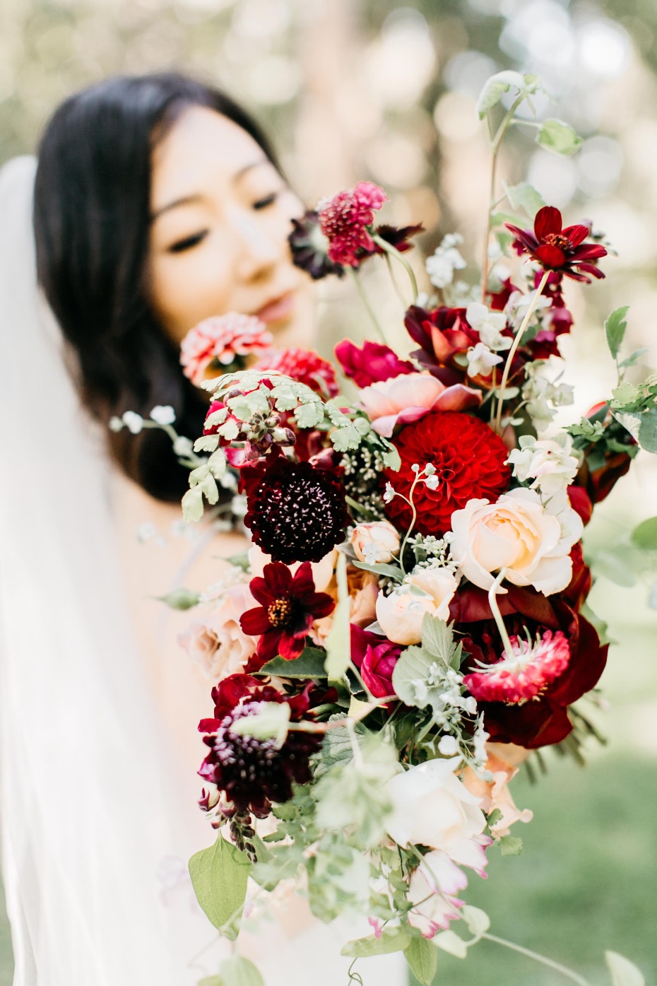 red and burgundy wildflower style bouquet
