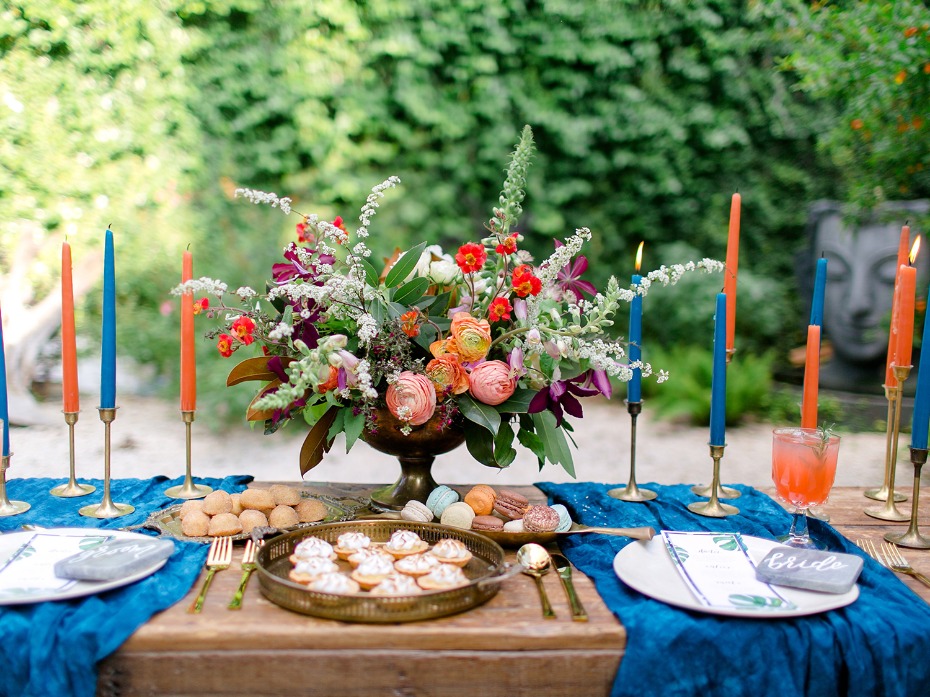 bright blue and orange wedding sweetheart table decor