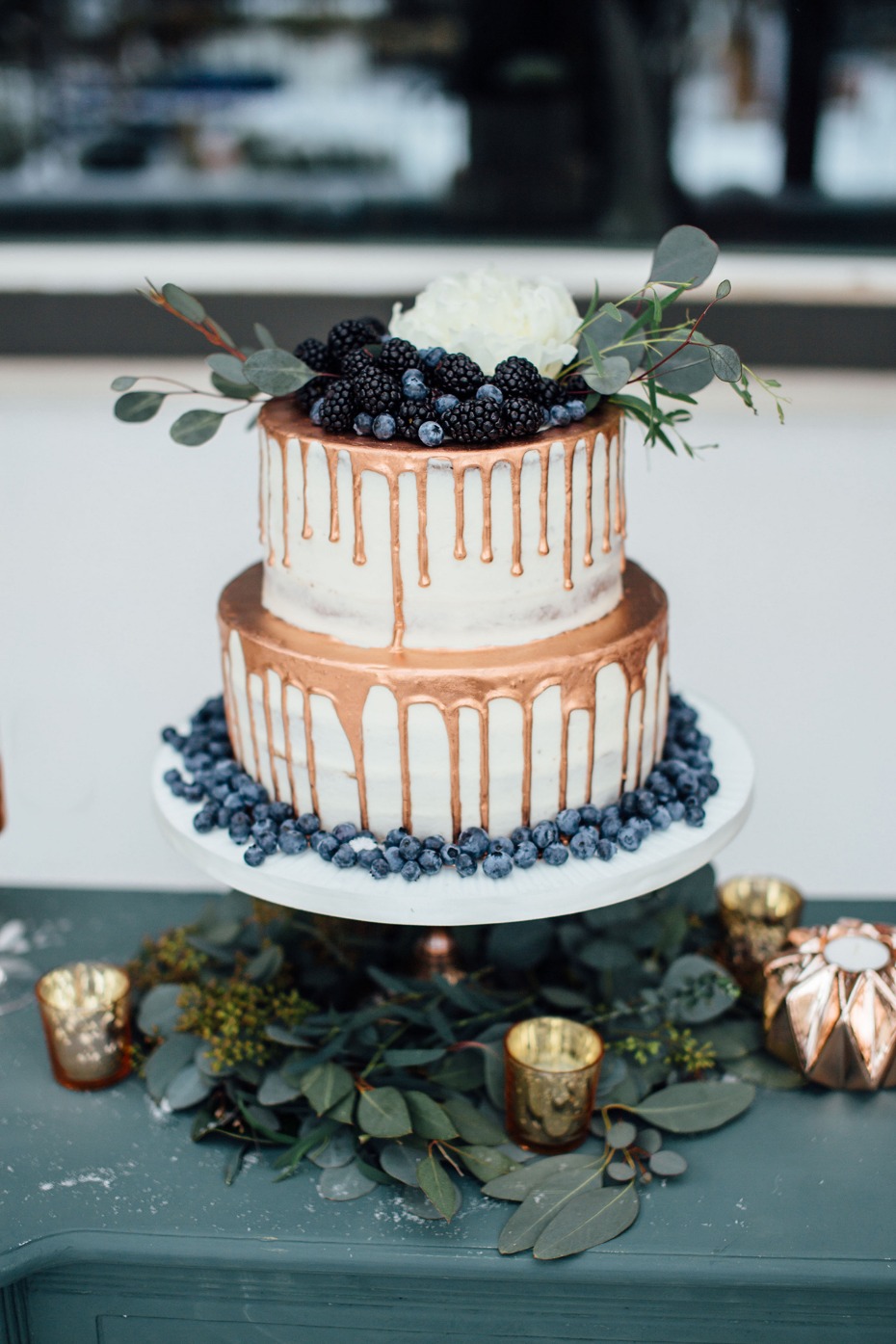 Gold drip naked cake with berries