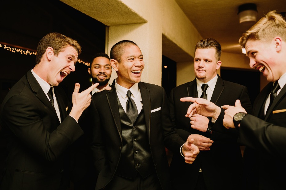 Groomsmen in black suits