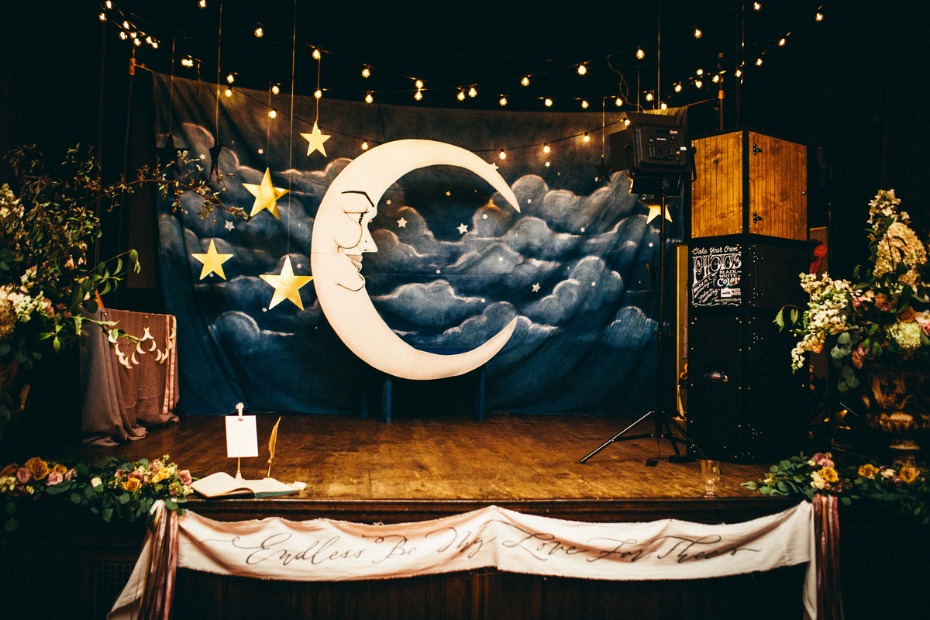 Dreamy stage set with moon stars and endless love banner