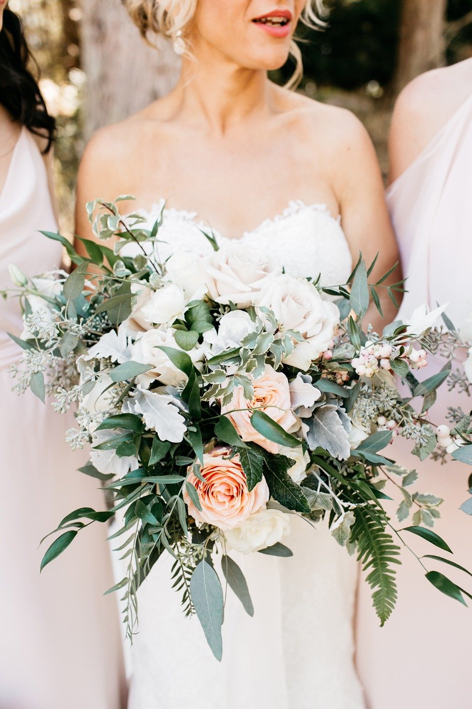white and peach wedding bouquet