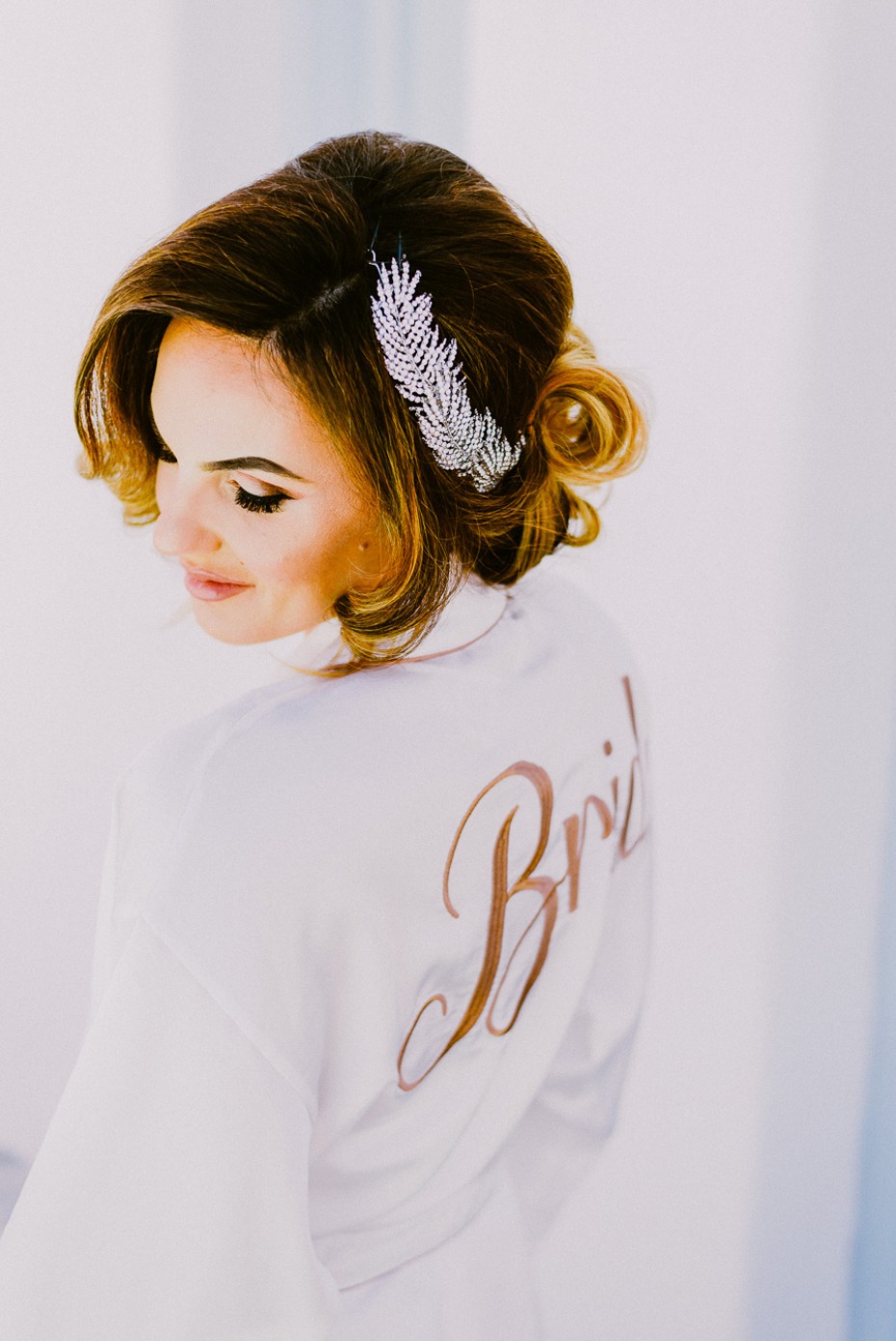 bridal getting ready look with elegant updo hair